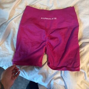 Alphalete Pink Bike Shorts with Elastic Waistband and Moisture-Wicking Fabric